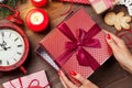 Female hands opening christmas gift Royalty Free Stock Photo