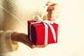 Female hands opening red gift box, copy space. Christmas, new year, birthday party, valentine`s day, mother`s and woman Royalty Free Stock Photo