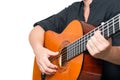 Female hands playing an acoustic guitar Royalty Free Stock Photo