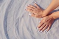 Female hands playing in sand Royalty Free Stock Photo