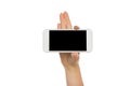 Female hands pointing on blank mobile phone screen