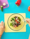 Female hands prepare salad top view flat lay Royalty Free Stock Photo
