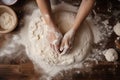 Female hands preparing dough on a wooden table