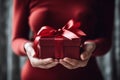 Female hands with present box holiday background Royalty Free Stock Photo