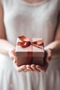 Female hands with present box holiday background Royalty Free Stock Photo