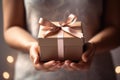 Female hands with present box holiday background Royalty Free Stock Photo