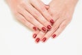 Female hands with professional red manicure Royalty Free Stock Photo