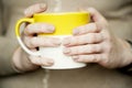 Female hands with soft beige manicure