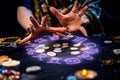 The female hands of the soothsayer read the runes. The zodiac circle glows above the runes. The concept of divination, astrology Royalty Free Stock Photo