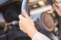 Female hands on steering wheel in car interior with sunlight reflection Royalty Free Stock Photo