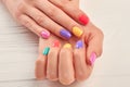 Female hands with stylish summer manicure.