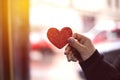 Female hands take heart, Happy Valentine& x27;s Day. Royalty Free Stock Photo