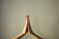 Female hands together close-up, gesture namaste, yoga, praying. Royalty Free Stock Photo
