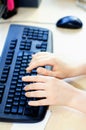 Female hands typing on computer keyboard Royalty Free Stock Photo