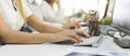 Female hands typing on computer keyboard at workplace Royalty Free Stock Photo