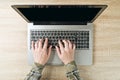 Female hands typing laptop computer keyboard, top view Royalty Free Stock Photo