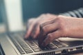 Female hands typing on laptop computer keyboard Royalty Free Stock Photo