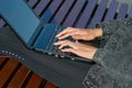 Female hands typing laptop keyboard close up Royalty Free Stock Photo