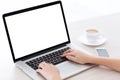 Female hands typing on a laptop keyboard with screen in Royalty Free Stock Photo