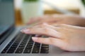 Female hands typing on notebook keyboard studying working with pc technology online education concept on table, close up Royalty Free Stock Photo