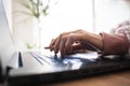 Female hands typing and using laptop computer Royalty Free Stock Photo