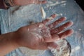 Female hands using flour in baking dough to make bread Royalty Free Stock Photo