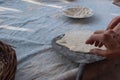 Female hands using flour in baking dough to make bread Royalty Free Stock Photo