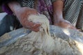 Female hands using flour in baking dough to make bread Royalty Free Stock Photo