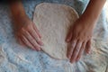 Female hands using flour in baking dough to make bread Royalty Free Stock Photo