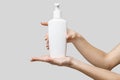 Female hands using hand sanitizer gel or liquid soap dispenser over light grey background Royalty Free Stock Photo