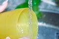 Female hands washing dishes Royalty Free Stock Photo