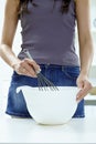 Female hands whipping eggs Royalty Free Stock Photo