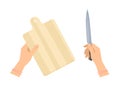 Female hands with wooden cutting board and steel kitchen knife. Royalty Free Stock Photo