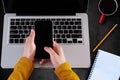 Female hands working on modern laptop. Office desktop on white background Royalty Free Stock Photo