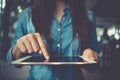 Female hands working with tablet touching screen computer. Woman