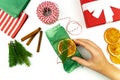 Female hands are wrapping a christmas gift. Christmas present wrapping background Royalty Free Stock Photo