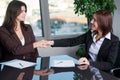 Female handshake over a deal