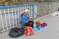 Female hawker selling handmade thick cotton shoes in winter, adobe rgb