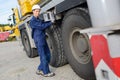 female heavy equipment operator setting vehicle Royalty Free Stock Photo