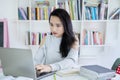 Female high school student learning with laptop Royalty Free Stock Photo