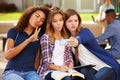 Female High School Students Taking Selfie On Campus