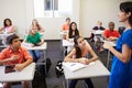 Female High School Teacher Taking Class