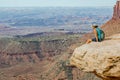 Female Hike Over Canyon Narrow