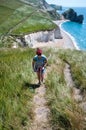 Female Hiker on coastal path Royalty Free Stock Photo