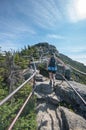 Female hiker enjoying the view from the trail to the summit of Whiteface Mountain