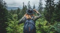 Female hiker exploring mountain landscape in nature for an adventurous outdoor trip