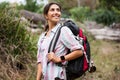 Female hiker hiking in forest Royalty Free Stock Photo