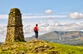 Female hiker on mountain summit