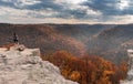 Female Hiker overlooks forest at Coopers Rock State Park WV