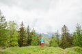 Female hiker in spring forest Royalty Free Stock Photo